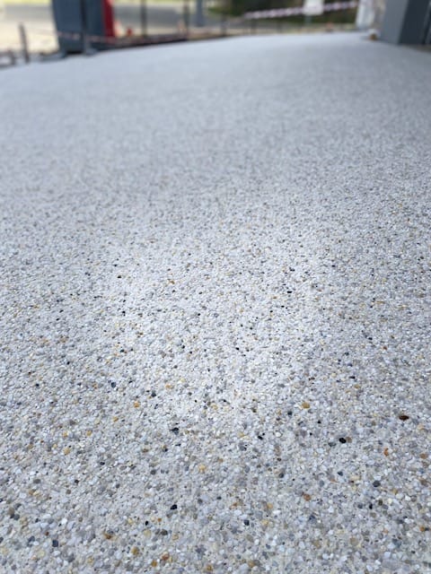 Close-up of exposed aggregate concrete texture